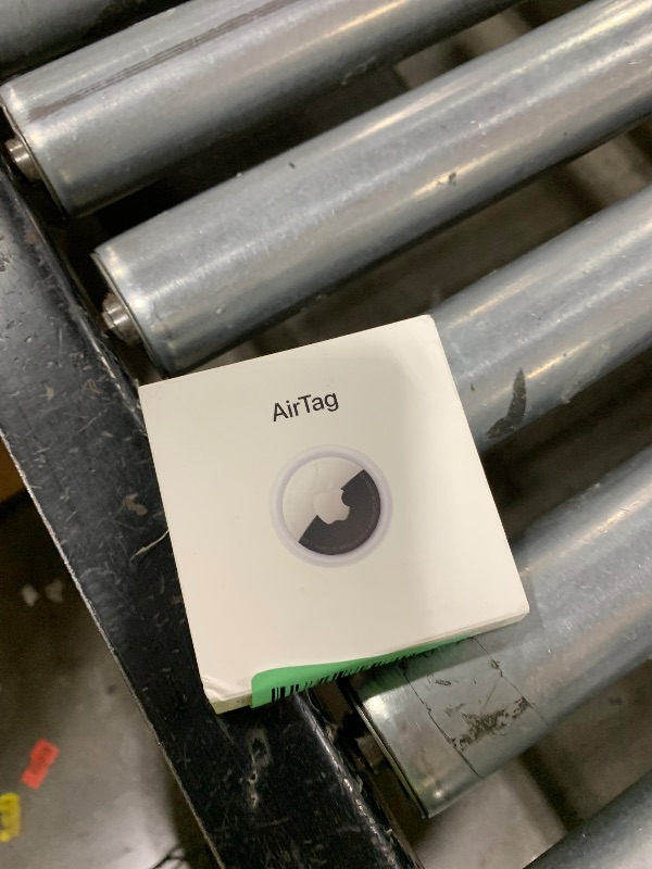 Photo 1 of Apple AirTag. Keep Track of and find Your Keys, Wallet, Luggage, Backpack, and More. Simple one-tap Set up with iPhone or iPad