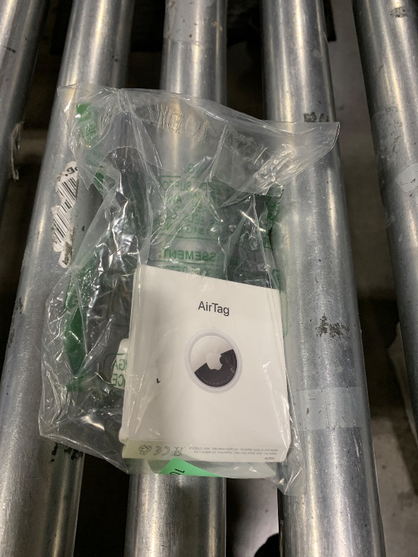 Photo 1 of Apple AirTag. Keep Track of and find Your Keys, Wallet, Luggage, Backpack, and More. Simple one-tap Set up with iPhone or iPad
