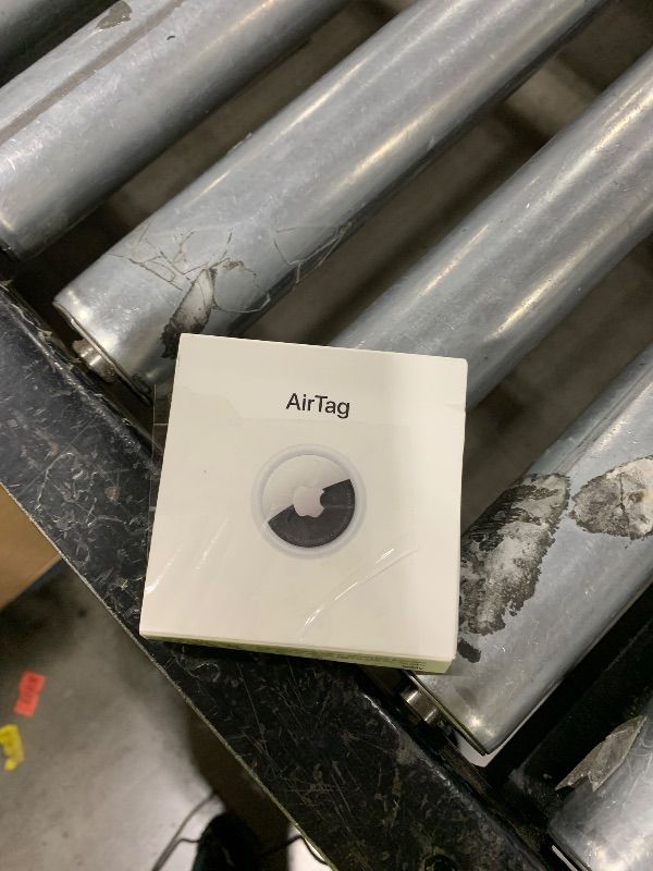 Photo 1 of Apple AirTag. Keep Track of and find Your Keys, Wallet, Luggage, Backpack, and More. Simple one-tap Set up with iPhone or iPad