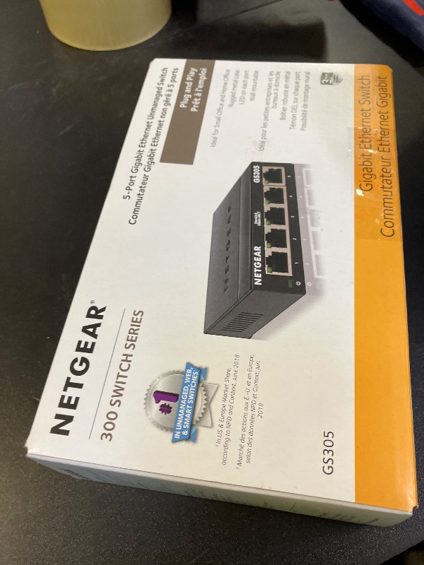 Photo 1 of NETGEAR 5-Port Gigabit Ethernet Unmanaged Essentials Switch (GS305) - Home Network Hub, Office Ethernet Splitter, Plug-and-Play, Silent Operation, Desktop or Wall Mount