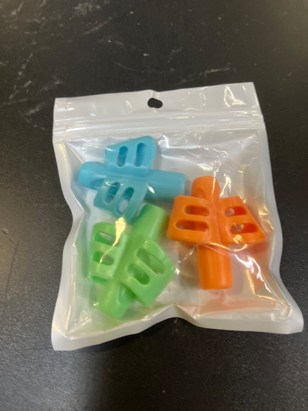 Photo 1 of JuneLsy Pencil Grips for Kids Handwriting Pencil gripper Pencil Holder Posture Correction Training Writing AIDS for preschooler Kids toddler Children Special Needs (3 PCS)