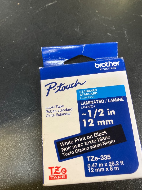 Photo 1 of Brother Genuine P-Touch TZe White Print on Black Label Tape (TZe335), Laminated,1/2in x 26.2ft (12mm x 8m), for Select P-Touch Label Makers, Durable, Water-Resistant, Indoor/Outdoor Use