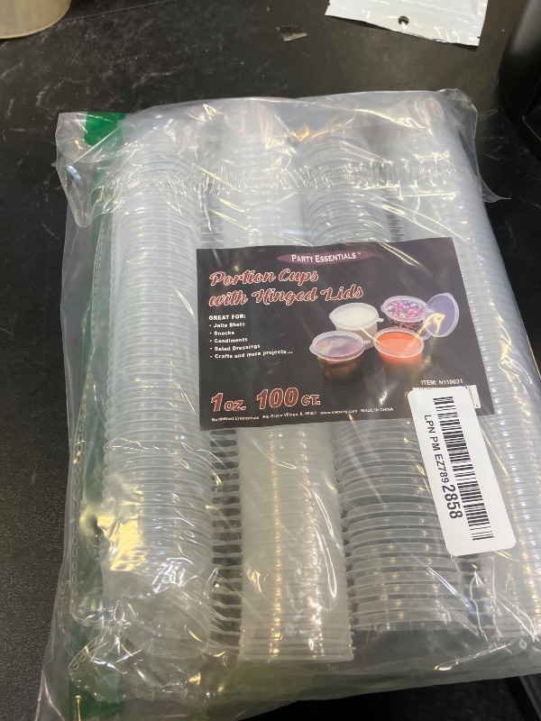 Photo 1 of Party Essentials Leak Proof Plastic Condiment Souffle Containers with Attached Airtight Portion Cup with Hinged Lid for Sauces, Samples, Slime, Jello Shot, Storage, Craft, 100 Sets, 1 oz, Clear