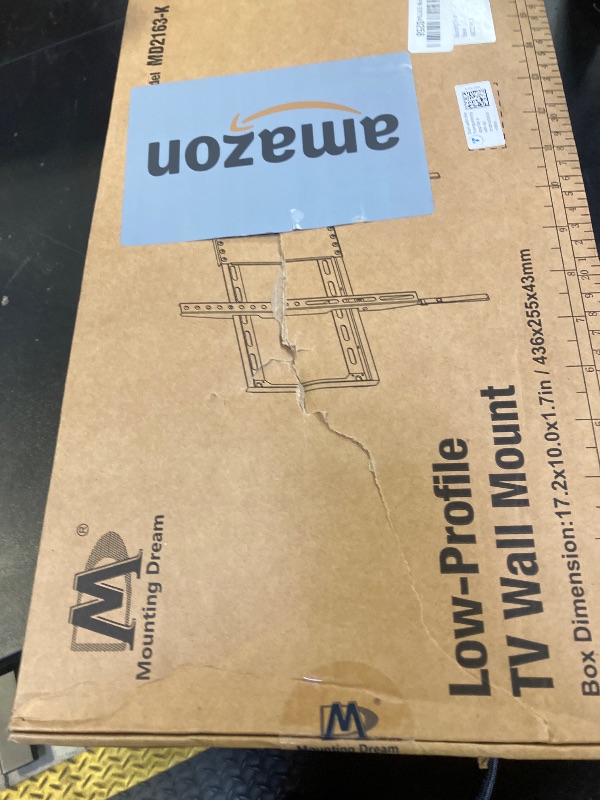 Photo 1 of Mounting Dream TV Mount Fixed for Most 42-84 Inch Flat Screen TVs, TV Wall Mount Bracket up to VESA 600 x 400mm and 132 lbs - Fits 16"/18"/24" Studs - Low Profile and Space Saving MD2163-K