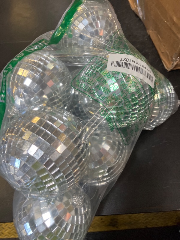 Photo 1 of Suwimut 9 Pack Mirror Disco Ball, 4 Inch Small Reflective Mirror Ball Ornaments Silver Hanging Disco Balls with Attached String for Reflect Light, Party Favor, Home Bands Decorations, Stage Props