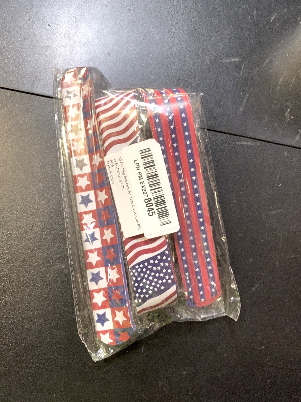 Photo 1 of Dminya 50 Pcs Slap Bracelets for Kids 4th of July Slap Bracelets Bulk Snap Bracelet Party Supplies Favors Classroom Prizes Exchanging Gifts
