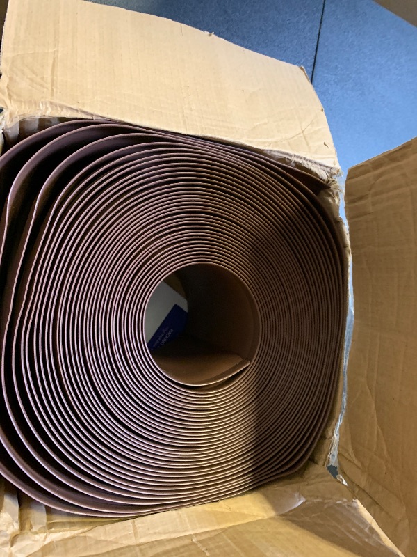 Photo 1 of Vinyl Wall Base Baseboard Molding Trim 6" Flexible Self Adhesive Rubber Wall Base Moulding Trim Peel and Stick Design, 6 Inch x 60 Feet, Brown