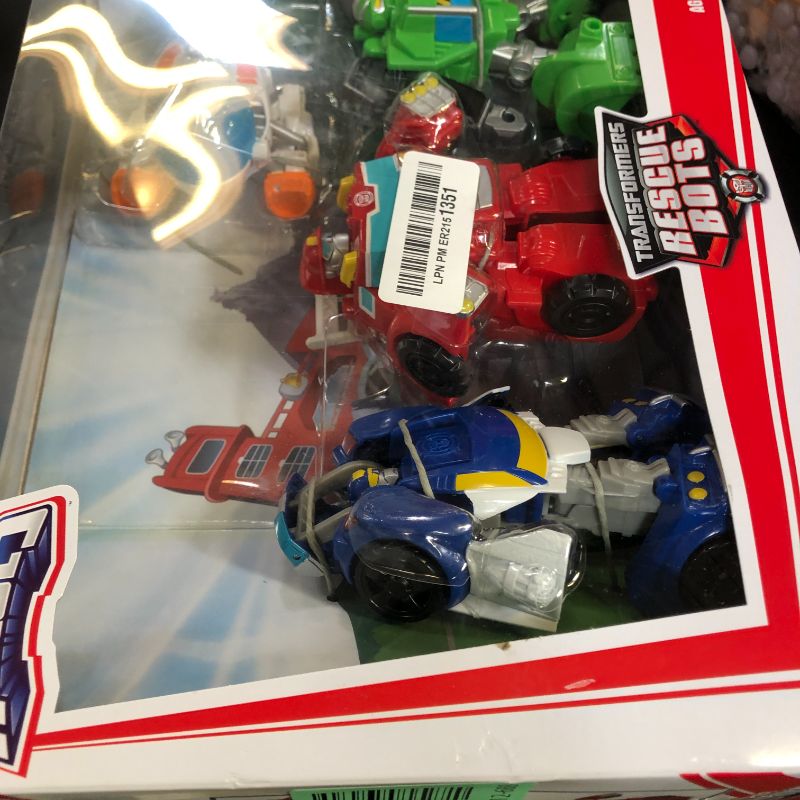 Photo 1 of Transformers Rescue Bots Griffin Rock Team Action Figures (Amazon Exclusive)