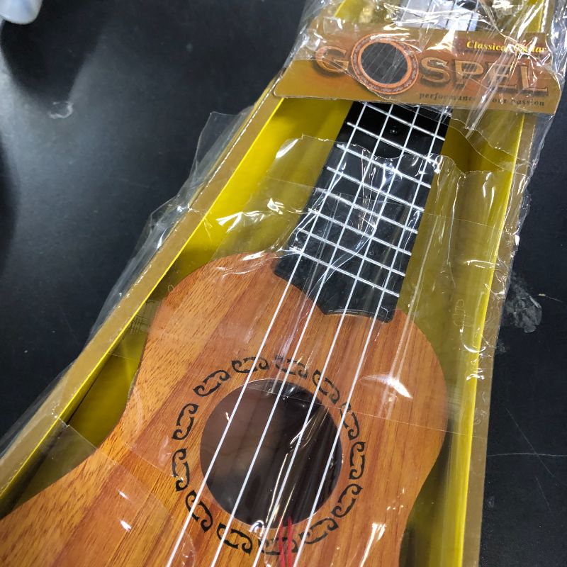 Photo 1 of Kids Toy Ukulele Guitar,17 Inch Classical Guitar Musical Toy,4 Strings Guitar Ukulele Educational Learning Toy for Toddlers and Preschoolers