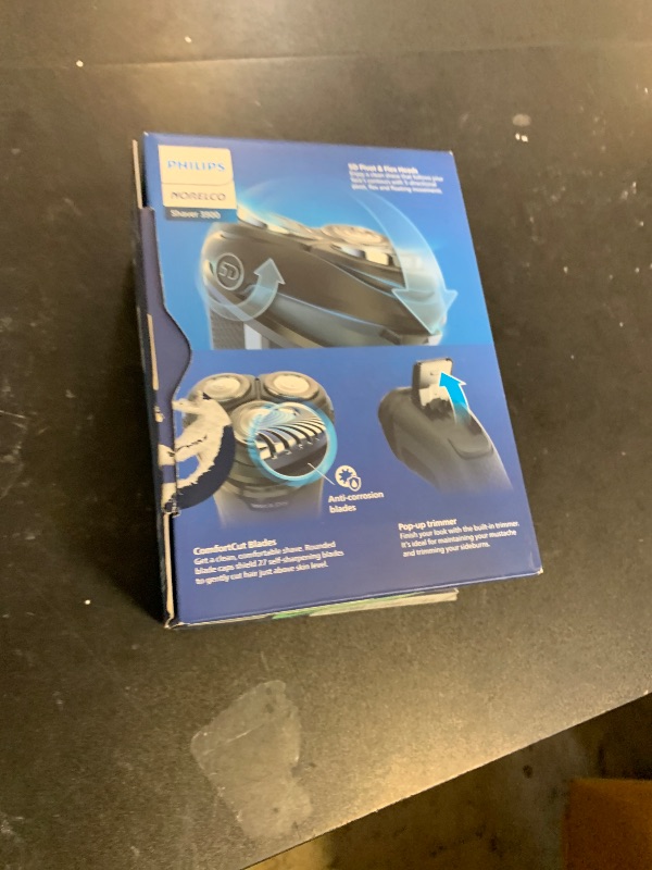 Photo 1 of Philips Norelco Shaver 3900 Series, Wet and Dry Electric Shaver, P-Cap, Travel Pouch, Charging Stand, Storm Blue, Model S3341/92