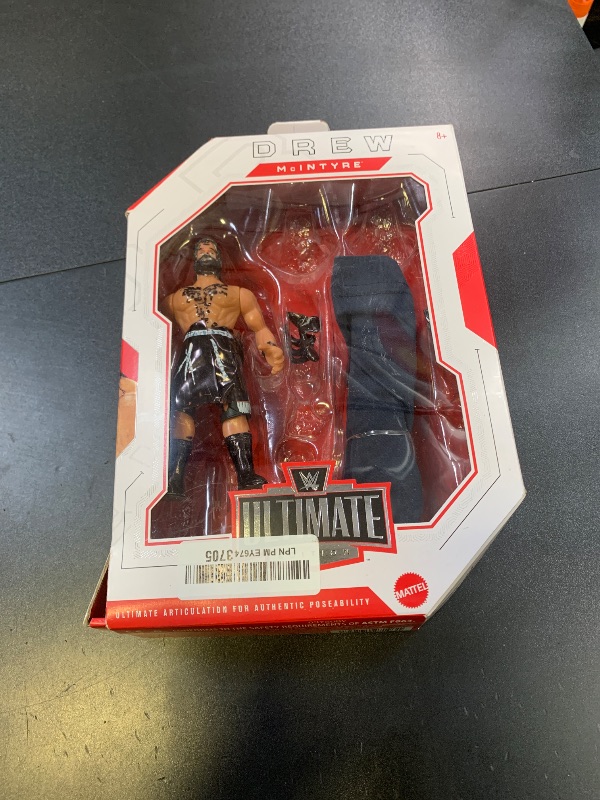 Photo 1 of Mattel WWE Ultimate Edition Action Figure & Accessories Set, Drew McIntyre 6-inch Collectible, Swappable Heads & Hands, 30 Articulation Points