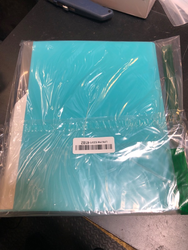 Photo 1 of Dunwell Presentation Binder 24-Pocket, Displays 48 Pages, 8.5x11 Portfolio Binder with Plastic Sleeves, Storage and Organizer for Documents, Certificates, Projects, Photos (Aqua)