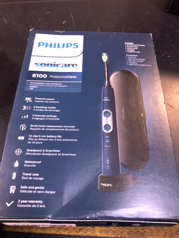 Photo 1 of Philips Sonicare ProtectiveClean 6100 Rechargeable Electric Toothbrush, with Pressure Sensor, 3 Cleaning Modes, SmarTimer and QuadPacer, 14-Day Battery Life, Travel Case, Navy Blue, Model HX6871/49