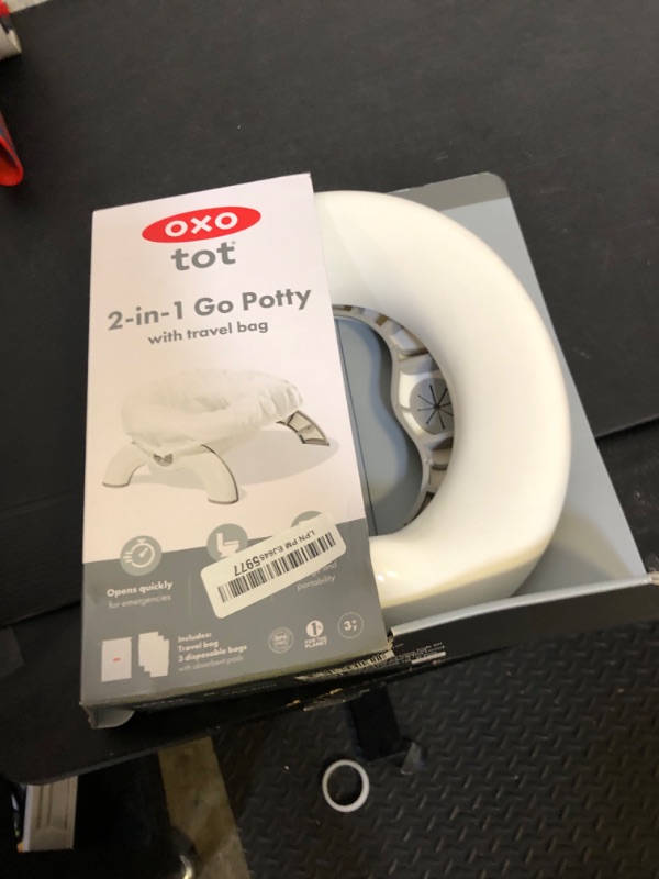 Photo 1 of OXO Tot 2-in-1 Go Portable Potty with Travel Bag, Travel Potty Seat for Toddler