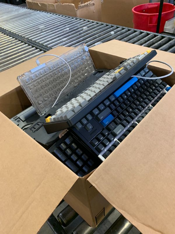 Photo 1 of BOX SET OF KEYBOARDS 