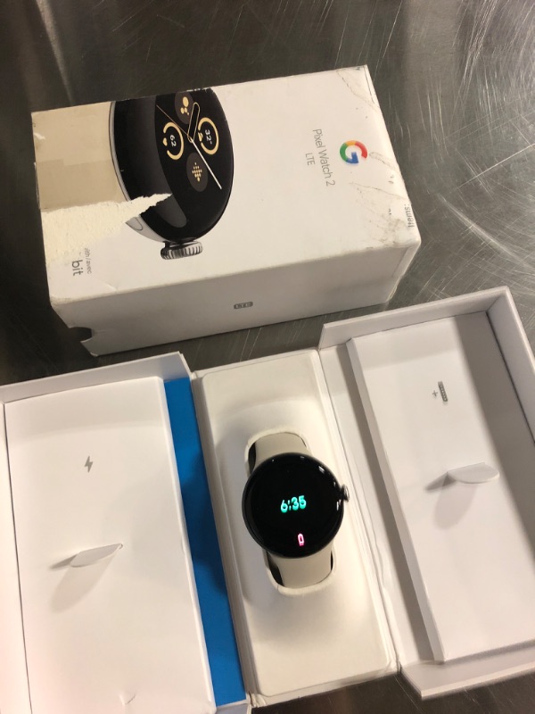 Photo 1 of *locked* Google Pixel Watch 2 (Previous Model) with Best of Fitbit - Heart Rate Tracking, Stress Management, Safety Features - Android Smartwatch - Polished Silver Aluminum Case - Porcelain Active Band - LTE