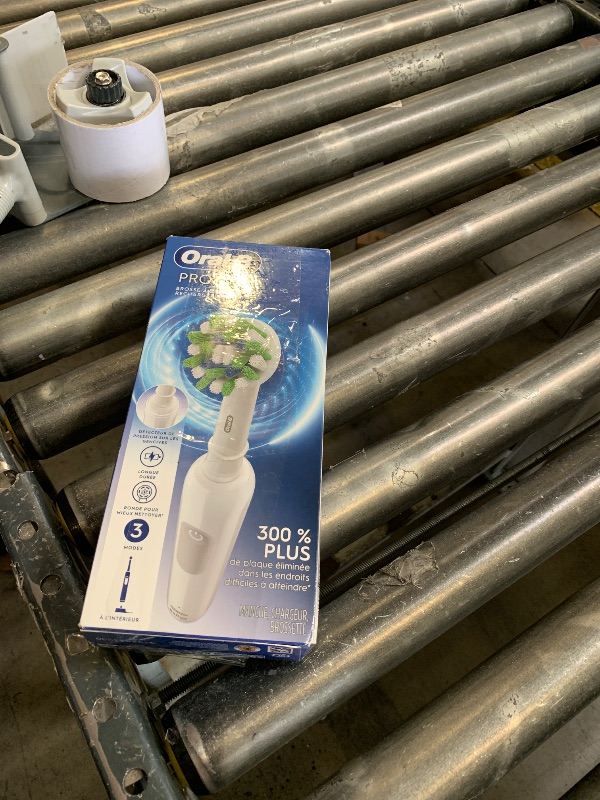 Photo 1 of Oral-B Pro 1000 Rechargeable Electric Toothbrush, White