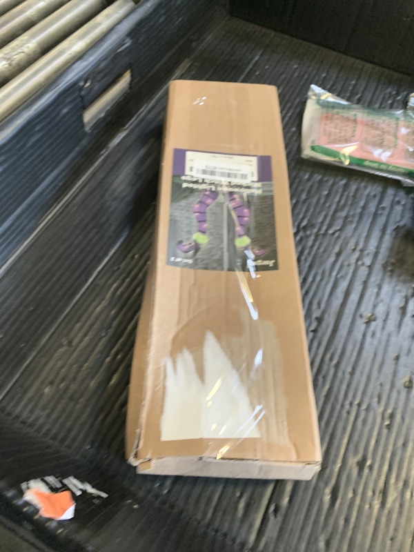 Photo 1 of Juegoal Set of 2 Halloween Lighted Wicked Purple Witch Legs with Stakes, 22" Light Up Tinsel Halloween Yard Sign Prop Timer & 8 Modes, Battery Operated for Outdoor Party Haunted House Garden Decor