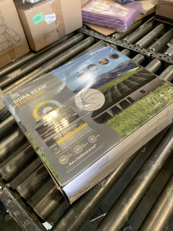 Photo 1 of Intex 64779E Dura-Beam Standard Prestige Air Mattress: Fiber-Tech - Queen Size - Hand-Held Battery Pump - 10in Bed Height - 600lb Weight Capacity
