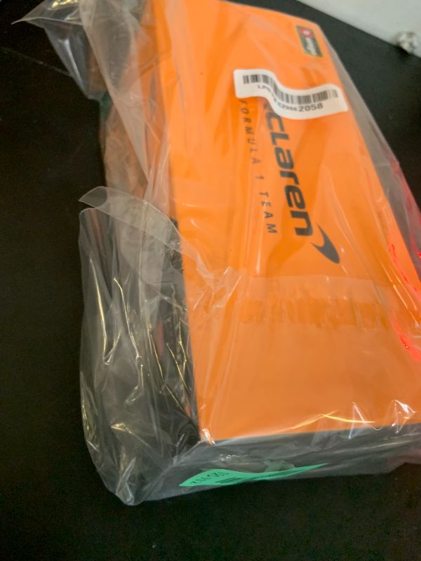 Photo 1 of Bburago 1:24 2024 Race McLaren MCL38 with Helmet, Norris #4