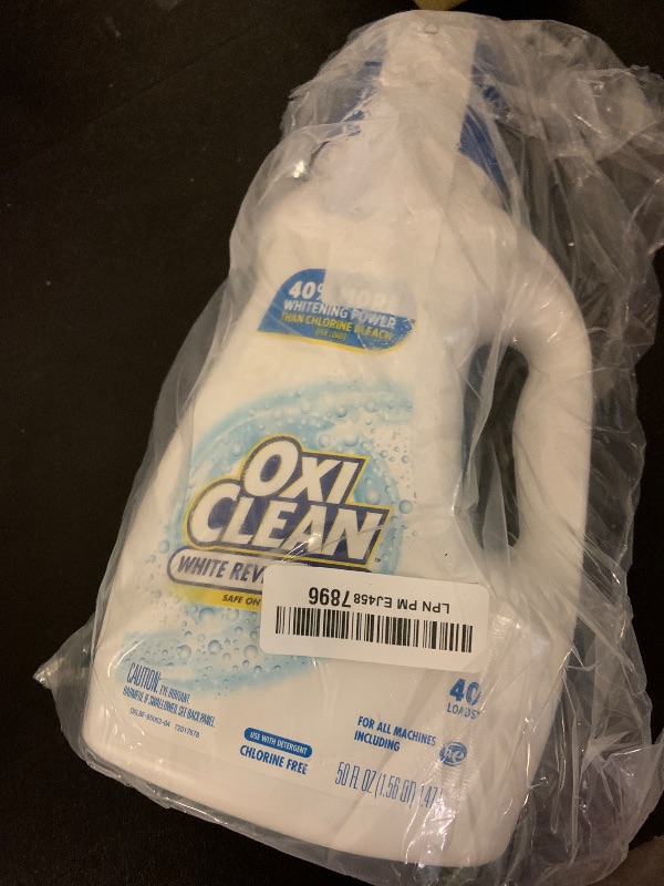 Photo 1 of OxiClean White Revive Laundry Whitener and Stain Remover Liquid, 50 fl oz
