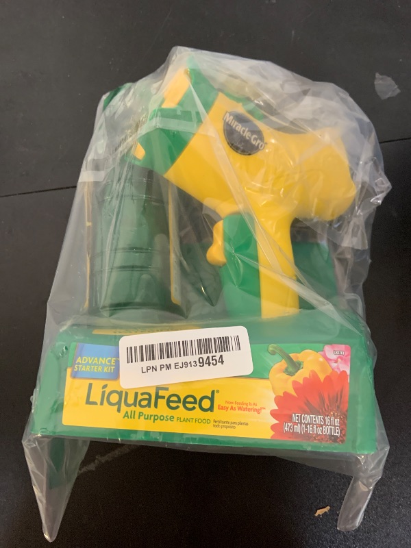 Photo 1 of Miracle-Gro LiquaFeed All Purpose Plant Food Advance Starter Kit, For Flowers, Vegetables, Trees and Shrubs, One 16 oz. Plant Food and One Feeder