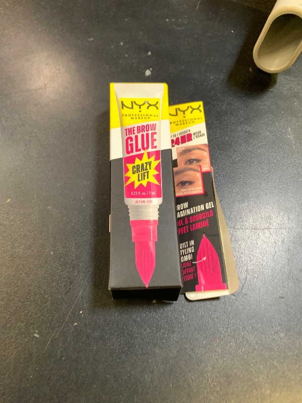 Photo 1 of NYX PROFESSIONAL MAKEUP The Brow Glue Crazy Lift, Brow Lamination Gel with 16HR Strong Hold & Built-In Styling Comb - Clear Eyebrow Gel