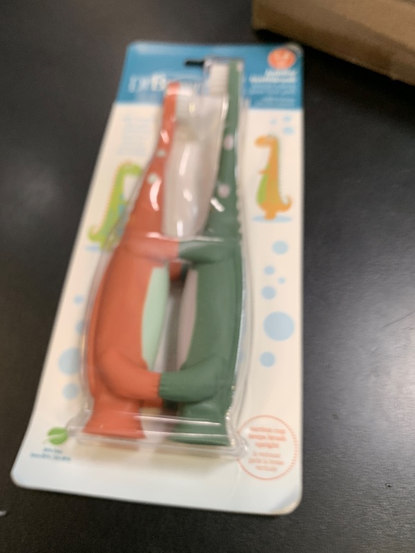 Photo 1 of Dr. Brown's Toddler Toothbrush, Dinosaur, Green and Orange, 2-Pack