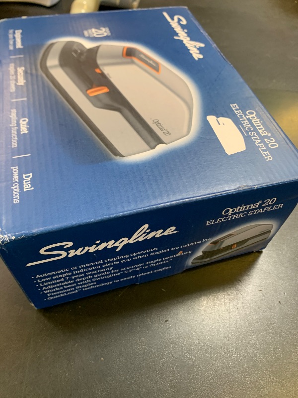 Photo 1 of Swingline Electric Stapler, 20 Sheet Capacity, Optima 20, Jam Free, Auto or Manual, Plug In or Battery, Silver (48208)