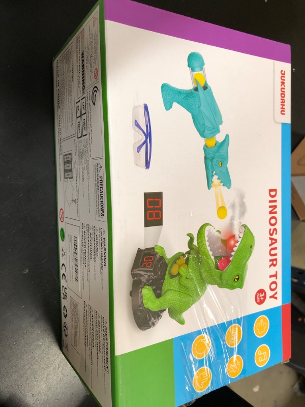 Photo 1 of JUKUDAHU Dinosaur Shooting Boy Toys for Kids Age 3 4 5 6 7 8 - Moveable Shooting Game with Scoreboard, Light and Sound, 12 Foam Balls, Boy Toddler Toys 5-7 6-8 8-10, Competition Game Gifts (Green)