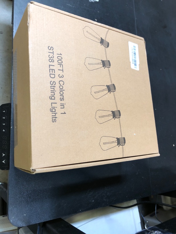 Photo 1 of Brightever 3 Color in 1 LED Outdoor String Lights with Remote, 100FT Edison Hanging String Lights for Outside Dimmable, Outdoor Lighting for Patio Café Bistro with 52 ST38 LED Bulbs, 2700K/4000K/5000K