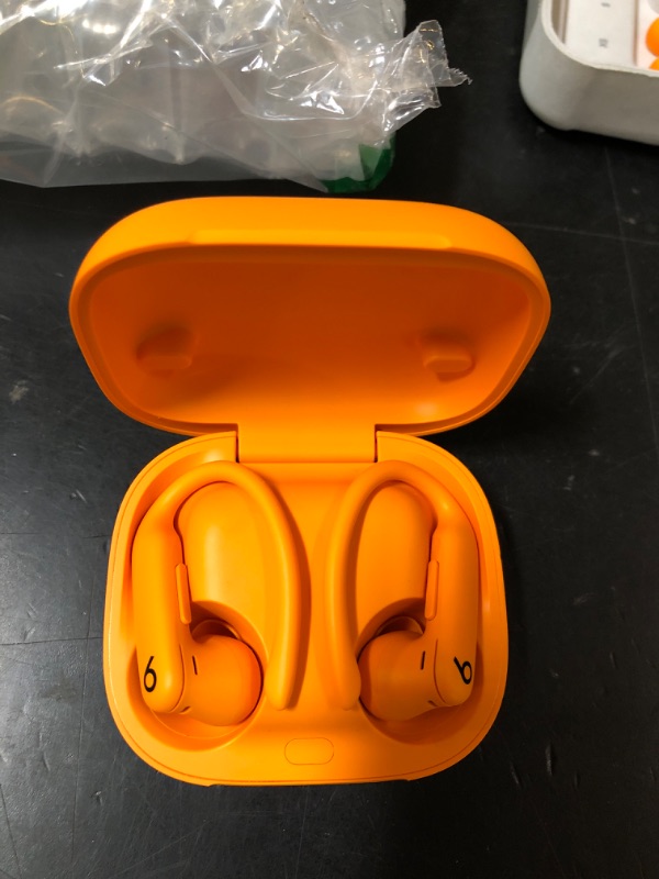 Photo 1 of Beats Powerbeats Pro 2 Wireless Bluetooth Earbuds - Noise Cancelling, Heart Rate Monitor, IPX4, Up to 45H Battery & Charging Case, Works with Apple & Android - Electric Orange