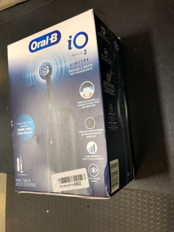 Photo 1 of Oral-B iO Simple Clean Rechargeable Electric Powered Toothbrush, Night Black with 1 Gentle Care Brush Head and 1 Black Travel Case - Automatic Pressure Sensor to Protect Gums - 3 Modes - 2 Min Timer