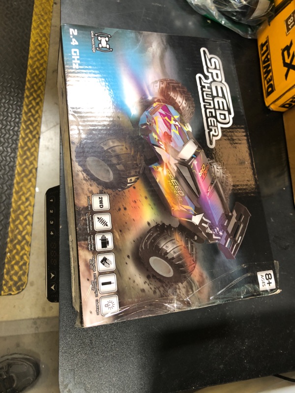 Photo 1 of AONEPTR Remote Control Car, All Terrain Remote Control Truck for Boy, 2.4GHz Rc Car with Bodylight and Two Rechargeable Batteries, 20KM/H Monster Truck Toys