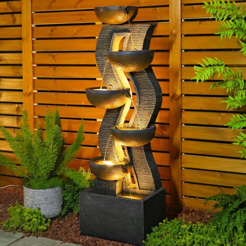 Photo 1 of  Tall Outdoor Water Fountain with Lights, 6-Tier Cascading Resin Waterfall Feature for Porch, Garden, Yard, Deck, Patio – Large Freestanding Outdoor Fountain and Waterfall Outside Decor
