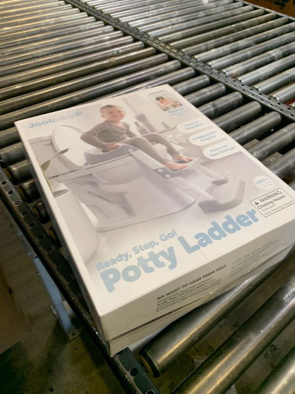 Photo 1 of Jool Baby Potty Training Seat with 2 Step Ladder for Toddlers - Soft Cushioned Seat & Splash Guard, Adjustable Height (Gray)