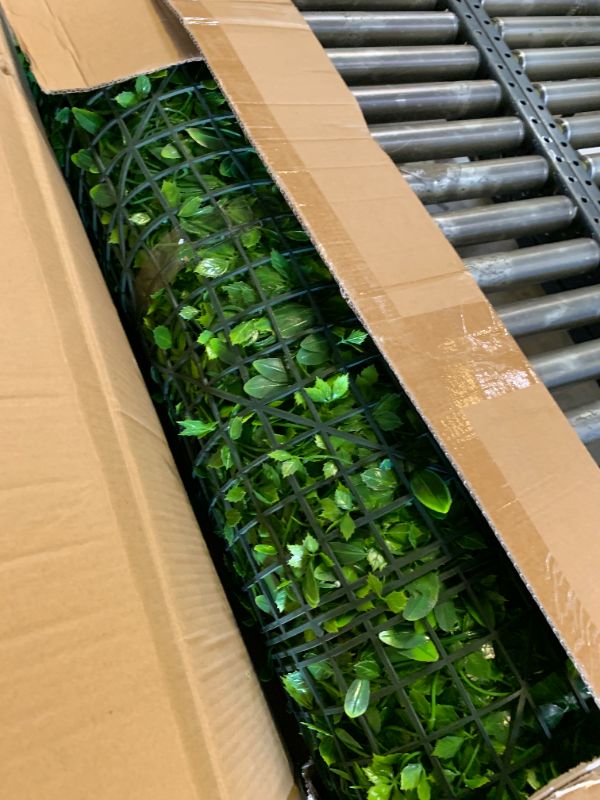 Photo 1 of ODTORY Artificial Plant Wall Roll: 5FT X 10FT (50 sqft) UV-Anti Ivy Privacy Fence Screen Faux Greenery Panels Backdrop Boxwood Ivy Vine Leaf Hedge for Indoor Outdoor Green Decor