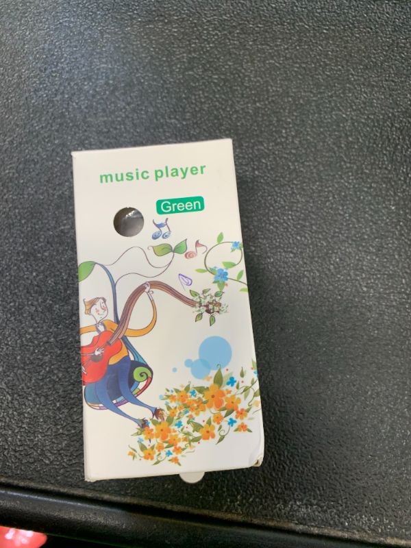 Photo 1 of green mp3 music player 