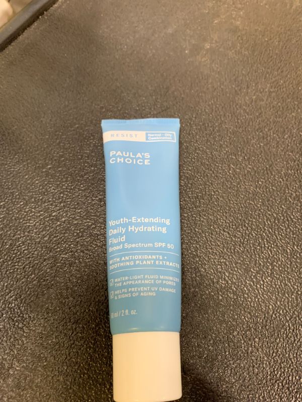 Photo 1 of Paula's Choice RESIST Daily Hydrating Fluid Face Moisturizer with SPF 50 Sunscreen, Face Sunscreen for Oily Skin, Chamomile & Vitamin E, UVA/UVB Protection, Fragrance-Free, TSA Friendly, 2 Fl Oz