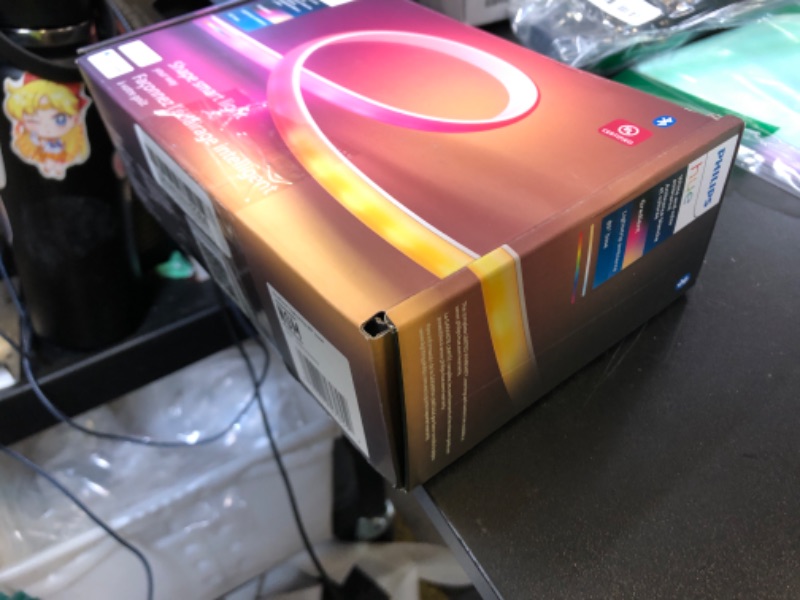 Photo 1 of Philips Hue Indoor 6-Foot Smart LED Light Strip Base Kit with Plug - Flowing Multicolor Effect - 1 Pack - Control with Hue App - Works with Alexa, Google Assistant and Apple HomeKit