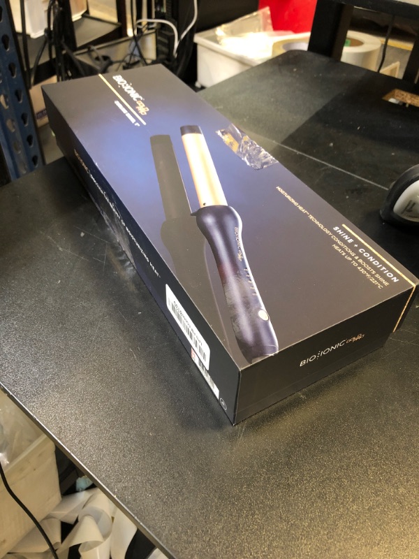 Photo 1 of Bio Ionic GoldPro 1" Curling Wand, Blue, Moisture Heat Technology & 24K Gold MX, Long Barrel Ceramic Curling Iron with Adjustable Heat, Versatile Hair Curler for Long-Lasting Curls
