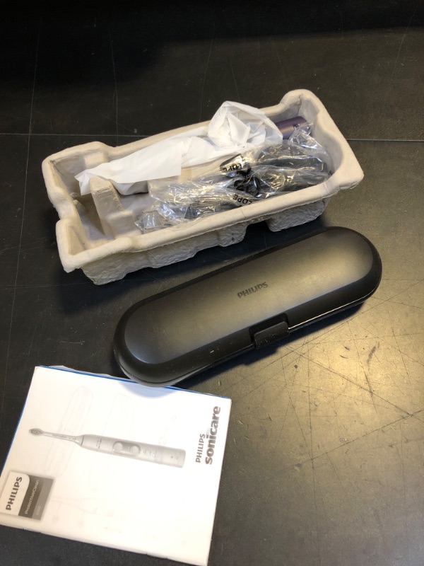 Photo 1 of Philips Sonicare ProtectiveClean 6100 Rechargeable Electric Toothbrush, with Pressure Sensor, 3 Cleaning Modes, SmarTimer and QuadPacer, 14-Day Battery Life, Travel Case, Deep Purple, Model HX6471/03