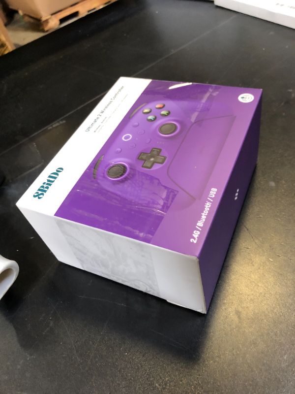 Photo 1 of 8Bitdo Ultimate 2 Wireless Gaming Controller with TMR Joysticks, Switchable Hall Effect/Tactile Triggers, 8Speed Wireless Tech, Charging Dock, RGB Fire Ring for PC & Android - Purper