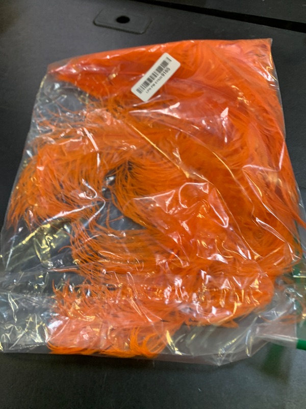 Photo 1 of THARAHT Orange Ostrich Feathers 12pcs Large Natural Bulk 16-18Inch 40cm-45cm for Wedding Party Centerpieces Halloween and Home Decoration Feathers