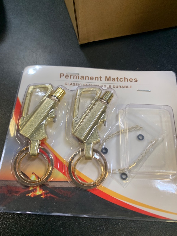 Photo 1 of YUSUD 2 Pack Permanent Match Infinity Lighter with Multitool Keychain Bottle Opener, Reusable Waterproof Match Strike Anywhere, Forever Flint Fire Starter for Outdoor Survival, for Men