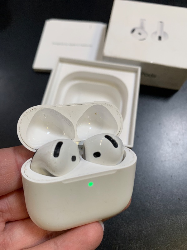 Photo 1 of Apple AirPods 
 Wireless Earbuds, Bluetooth Headphones, Personalized Spatial Audio, Sweat and Water Resistant, USB-C Charging Case, H2 Chip, Up to 30 Hours of Battery Life, Effortless Setup for iPhone