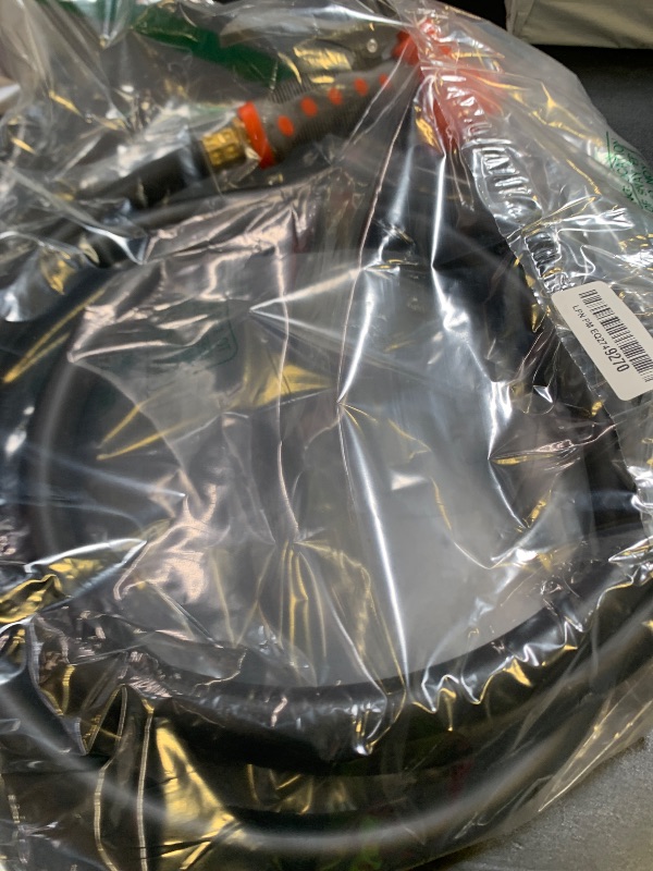 Photo 1 of Upgraded  Garden Hose,5/8inx10FT,No Kink Water Hose with 7 Function Nozzle,Heavy Duty Short Hose for Outside Car,Floor,Yard Washing,Garden Watering