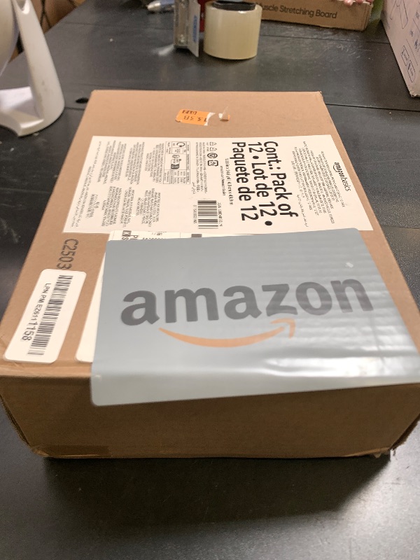 Photo 1 of Amazon Basics Strong Plastic Adhesive Packaging Tape for Shipping, Moving and Storage, Clear, Low Odor, 1.88 in x 54.6 yds, 12-Pack