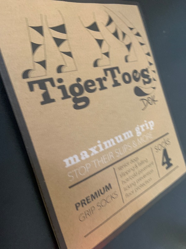 Photo 1 of DOK TigerToes Premium Non-Slip Dog Socks for Hardwood Floors - Extra-Thick Grip That Works Even When Twisted - Prevents Licking, Slipping, and Great for Dog Paw Protection - Size Medium