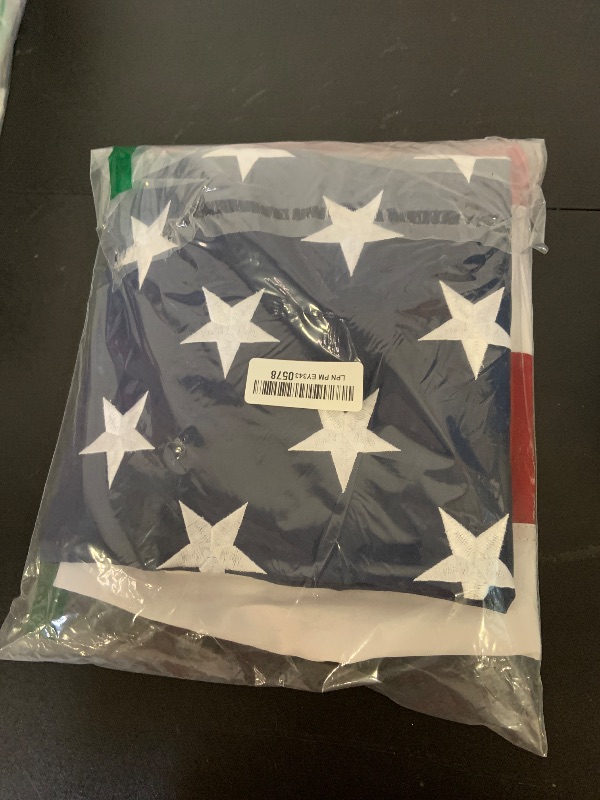 Photo 1 of American Flag 4x6 ft Deluxe Super Tough Series, Heavy Duty Spun Polyester, All Weather US Flag USA High Wind with Embroidered Stars, Brass Grommets, Ultra Durable United States Flag Outdoor Outside